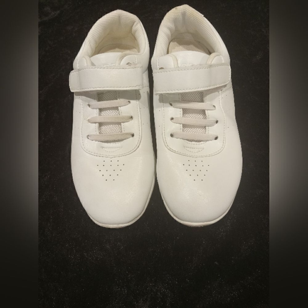 Pre- Loved  white sports shoes with velcro straps Step into comfort and style wi